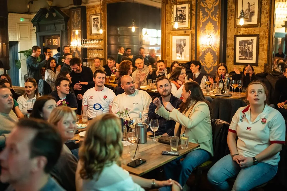 A lively crowd seated inside the Wheatsheaf in Tooting Bec